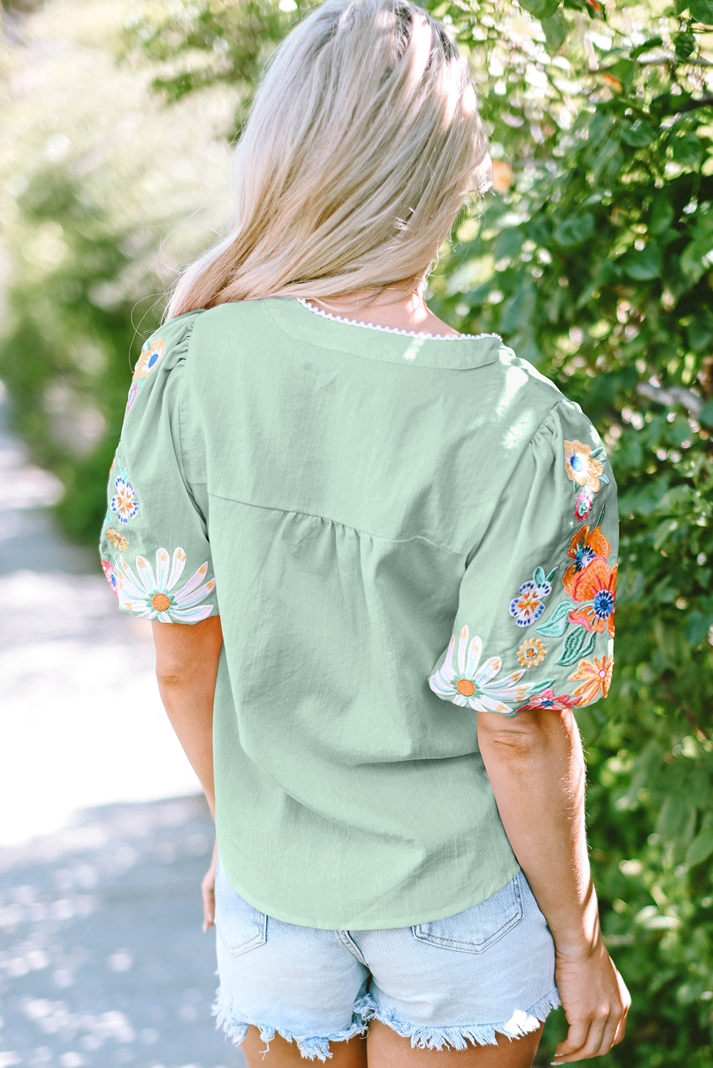 Clearly Aqua Floral Embroidered Puff Sleeve Split Neck Blouse.