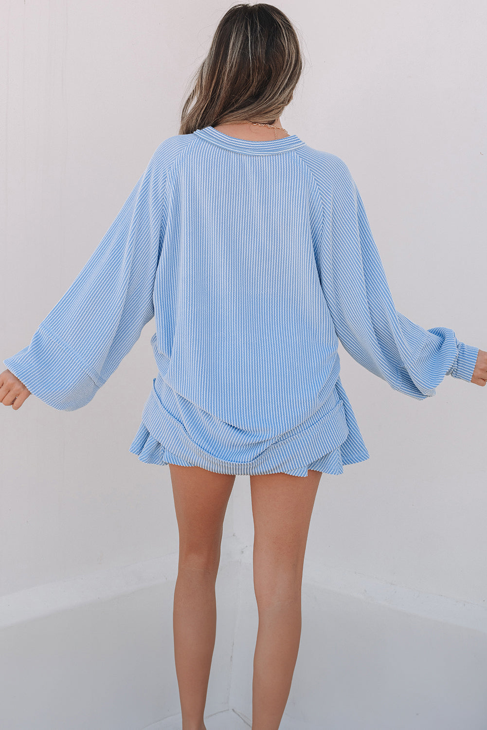 Sky Blue Corded Lantern Sleeve Top High Waist Ruffled Mini Skirt Set.