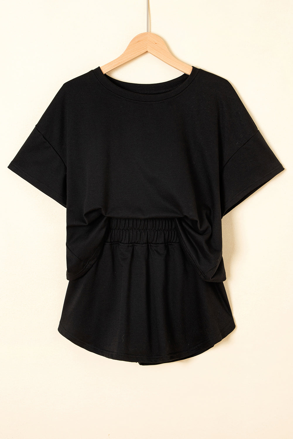Black 2pcs Cropped Tee and Ruffle High Waist Skort Set.