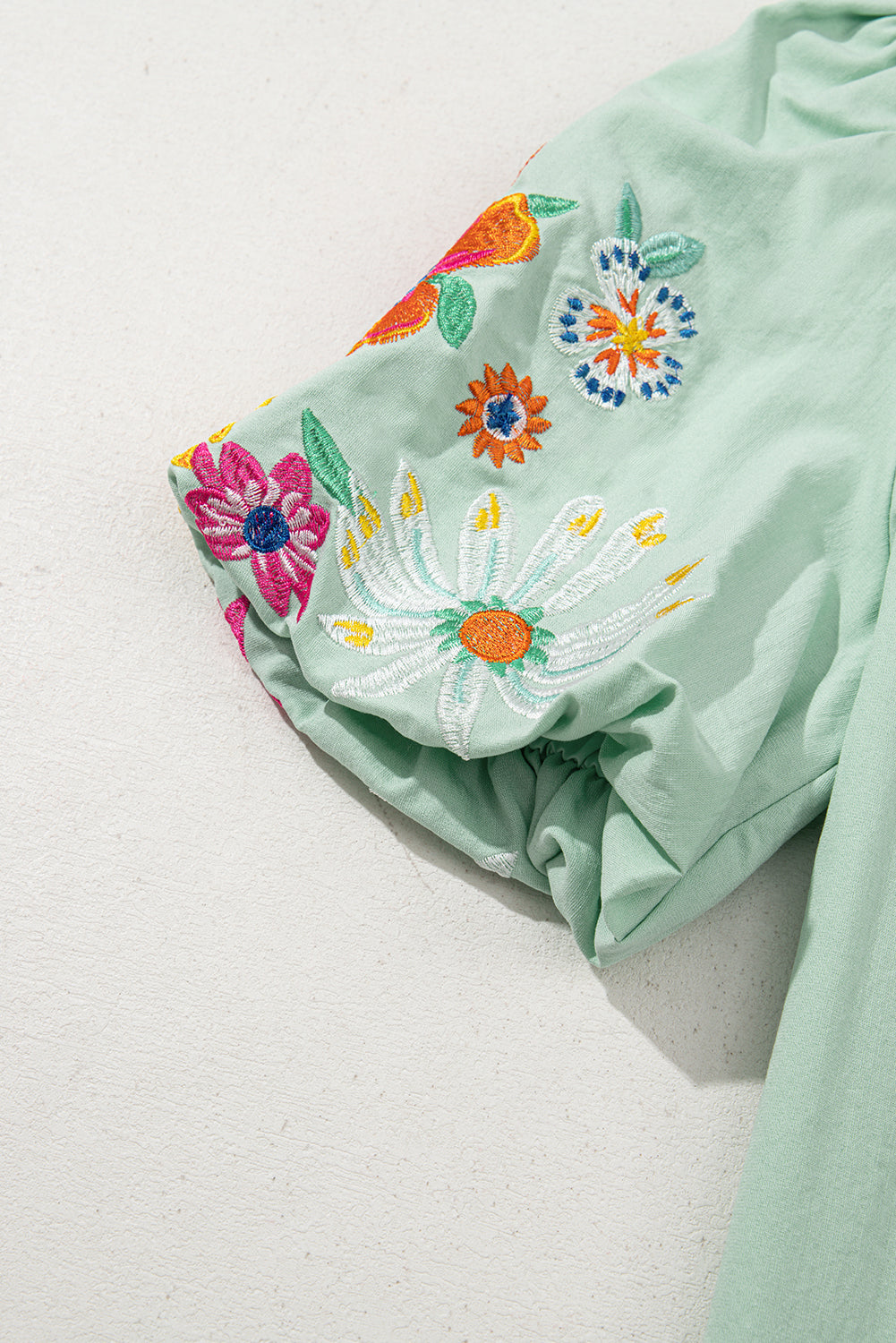Clearly Aqua Floral Embroidered Puff Sleeve Split Neck Blouse.