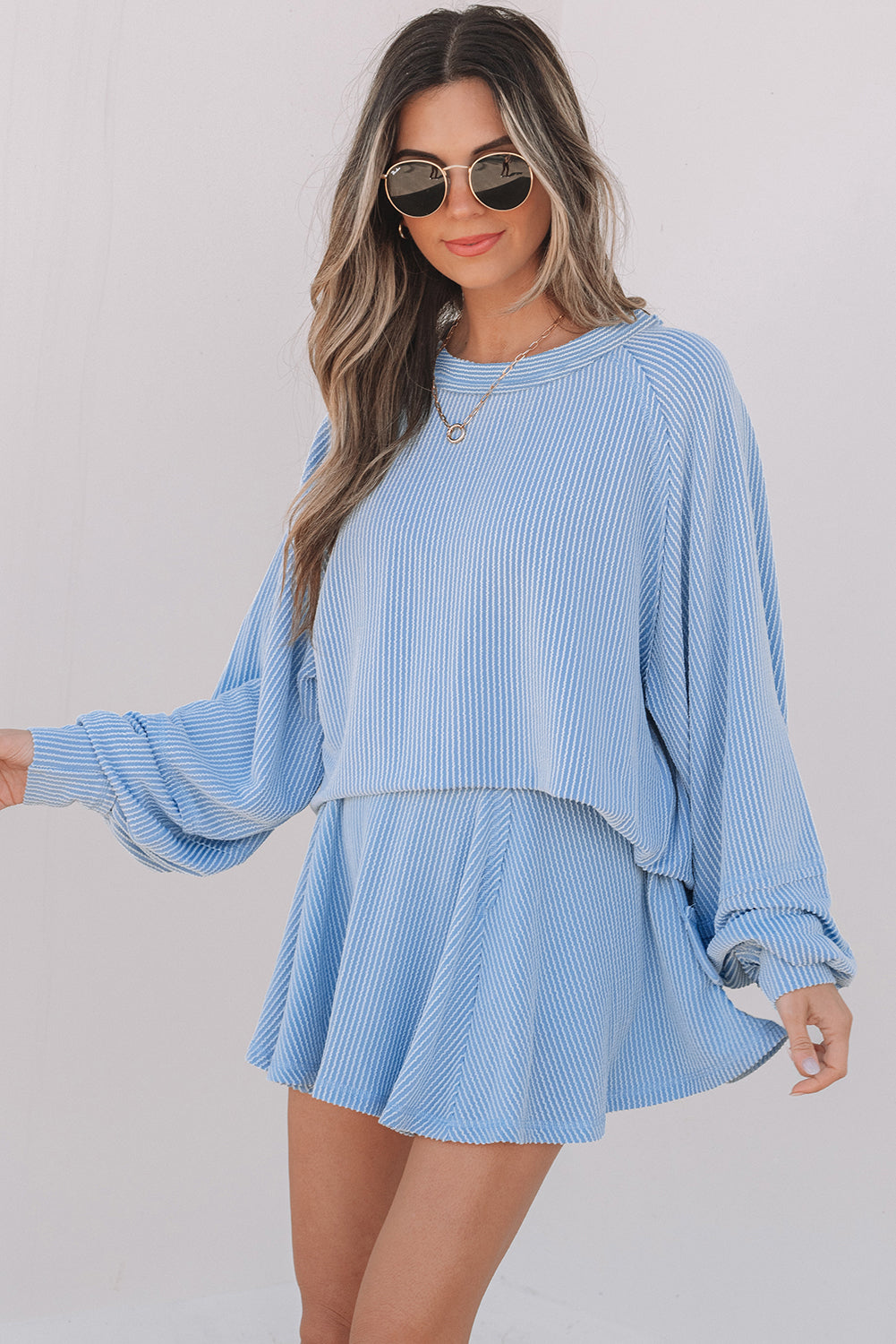 Sky Blue Corded Lantern Sleeve Top High Waist Ruffled Mini Skirt Set.