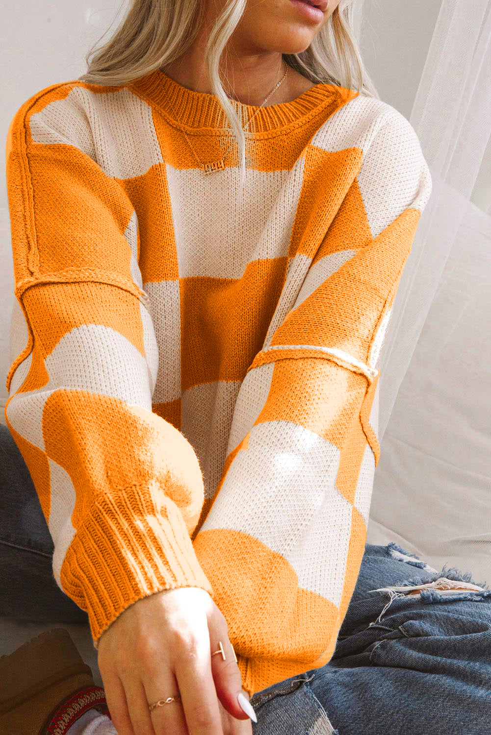 Orange Checkered Bishop Sleeve Sweater.