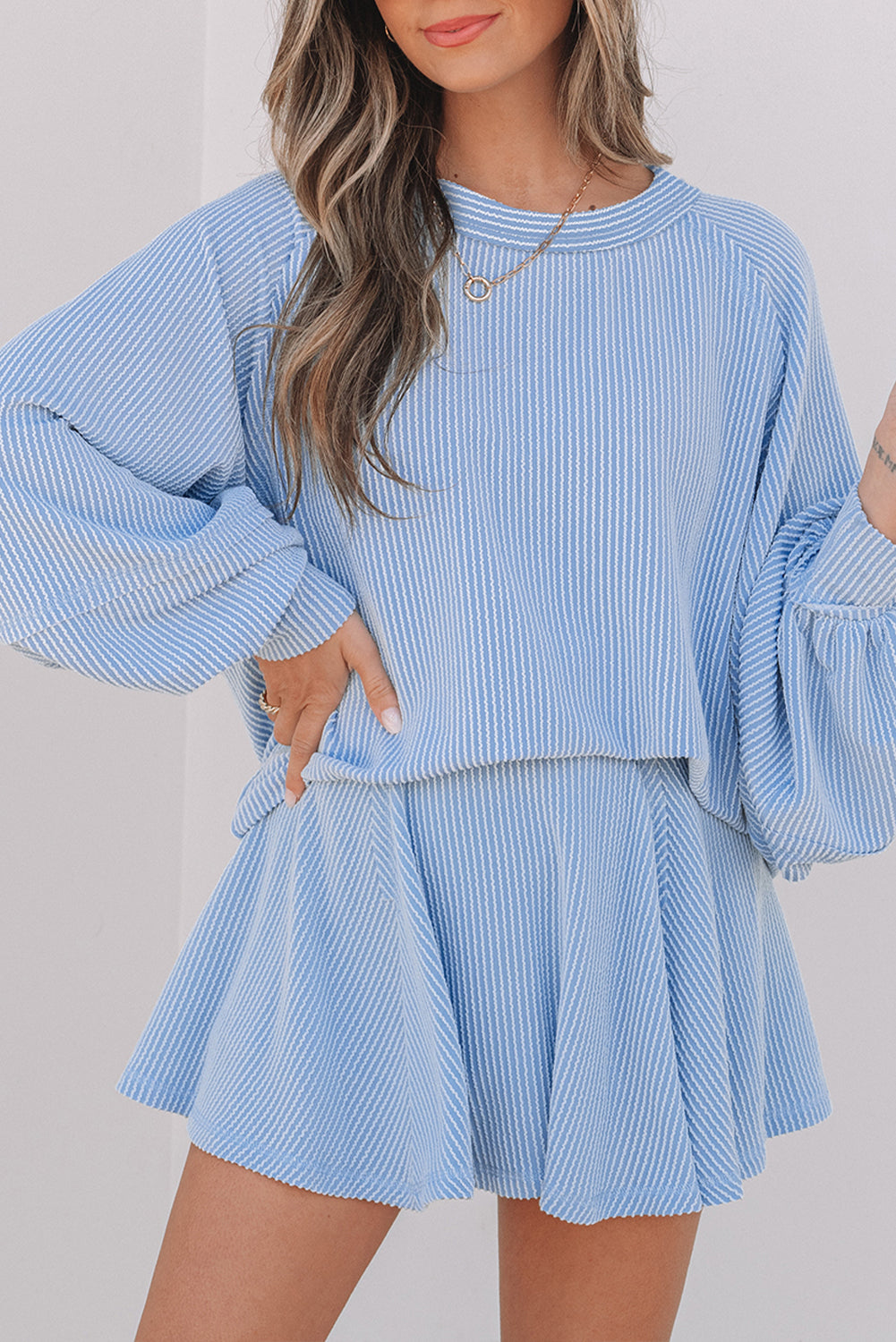 Sky Blue Corded Lantern Sleeve Top High Waist Ruffled Mini Skirt Set.