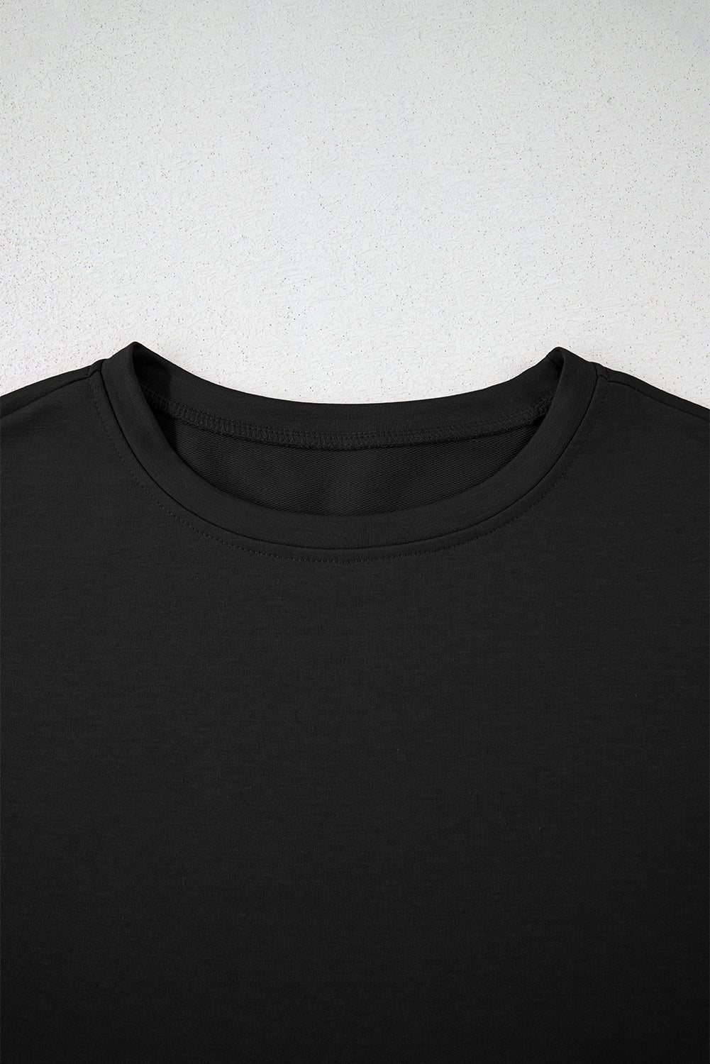 Black 2pcs Cropped Tee and Ruffle High Waist Skort Set.