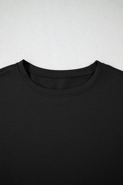 Black 2pcs Cropped Tee and Ruffle High Waist Skort Set.