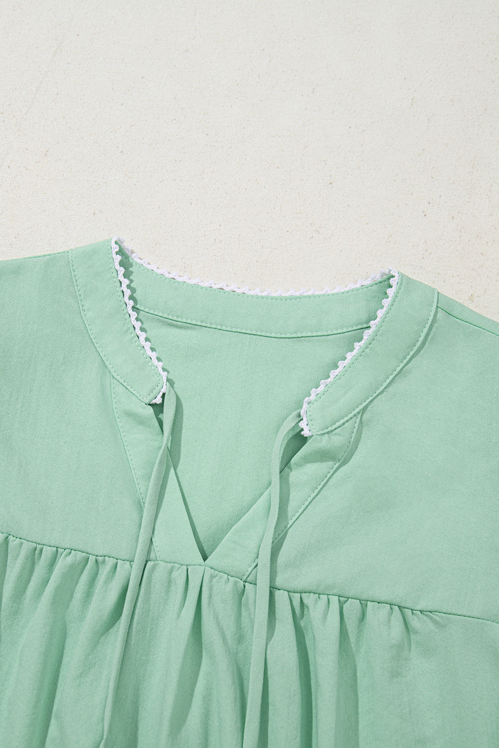 Clearly Aqua Floral Embroidered Puff Sleeve Split Neck Blouse.