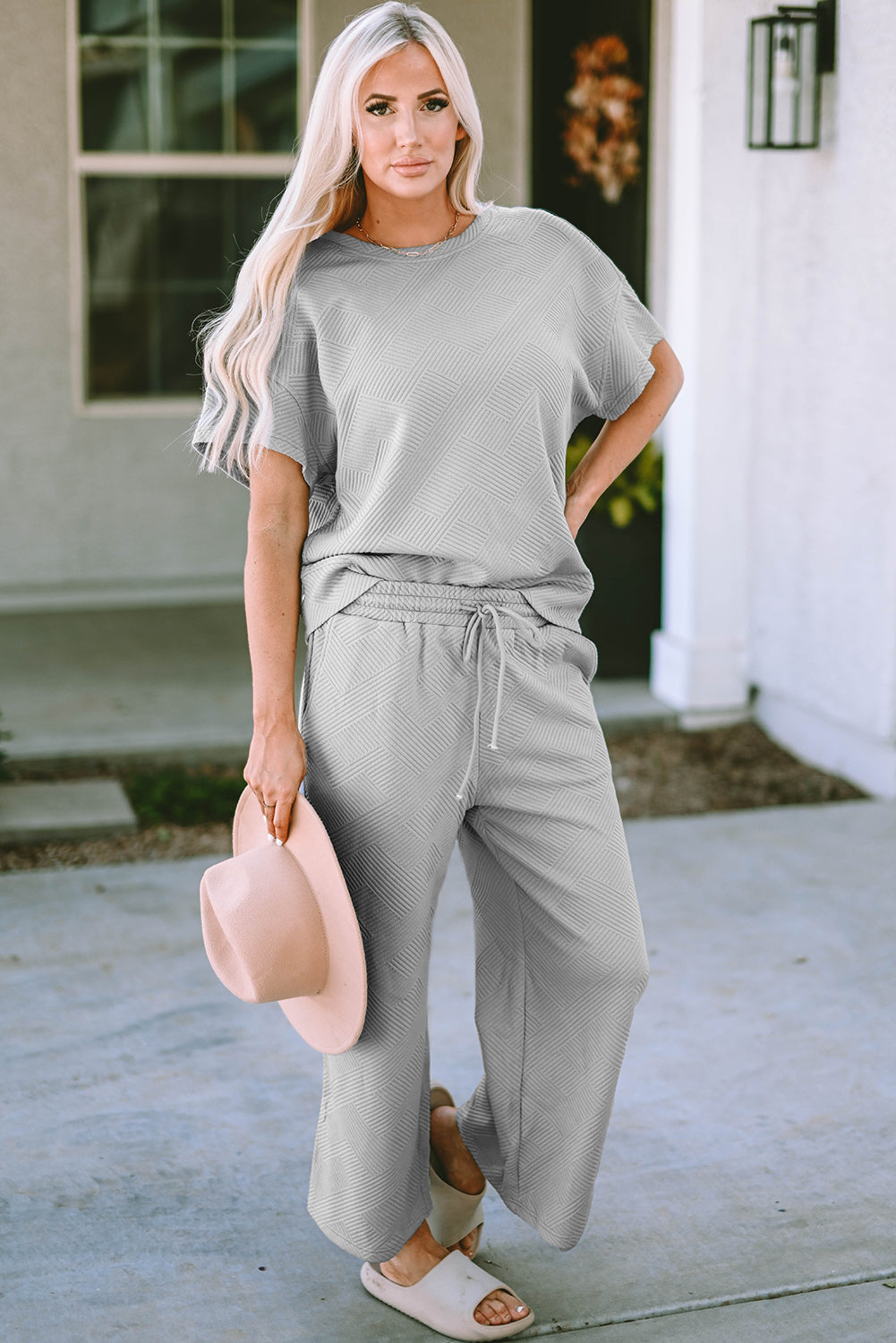 Gray Textured Loose Fit T Shirt and Drawstring Pants Set.