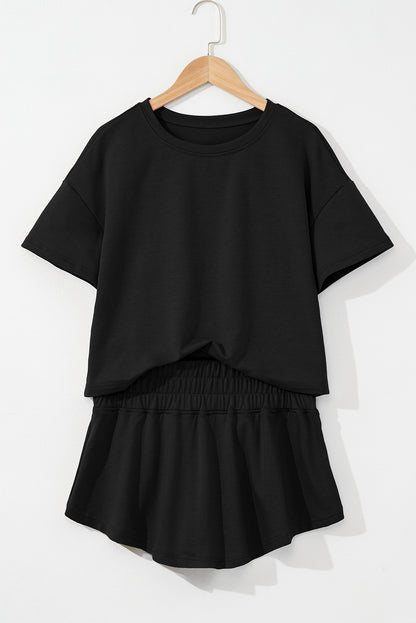 Black 2pcs Cropped Tee and Ruffle High Waist Skort Set.