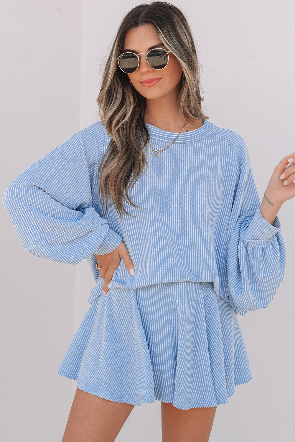 Sky Blue Corded Lantern Sleeve Top High Waist Ruffled Mini Skirt Set.